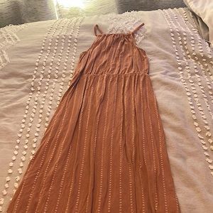 Pink dress from Bixby Nomad. Super soft and smooth fabric and a high neckline.